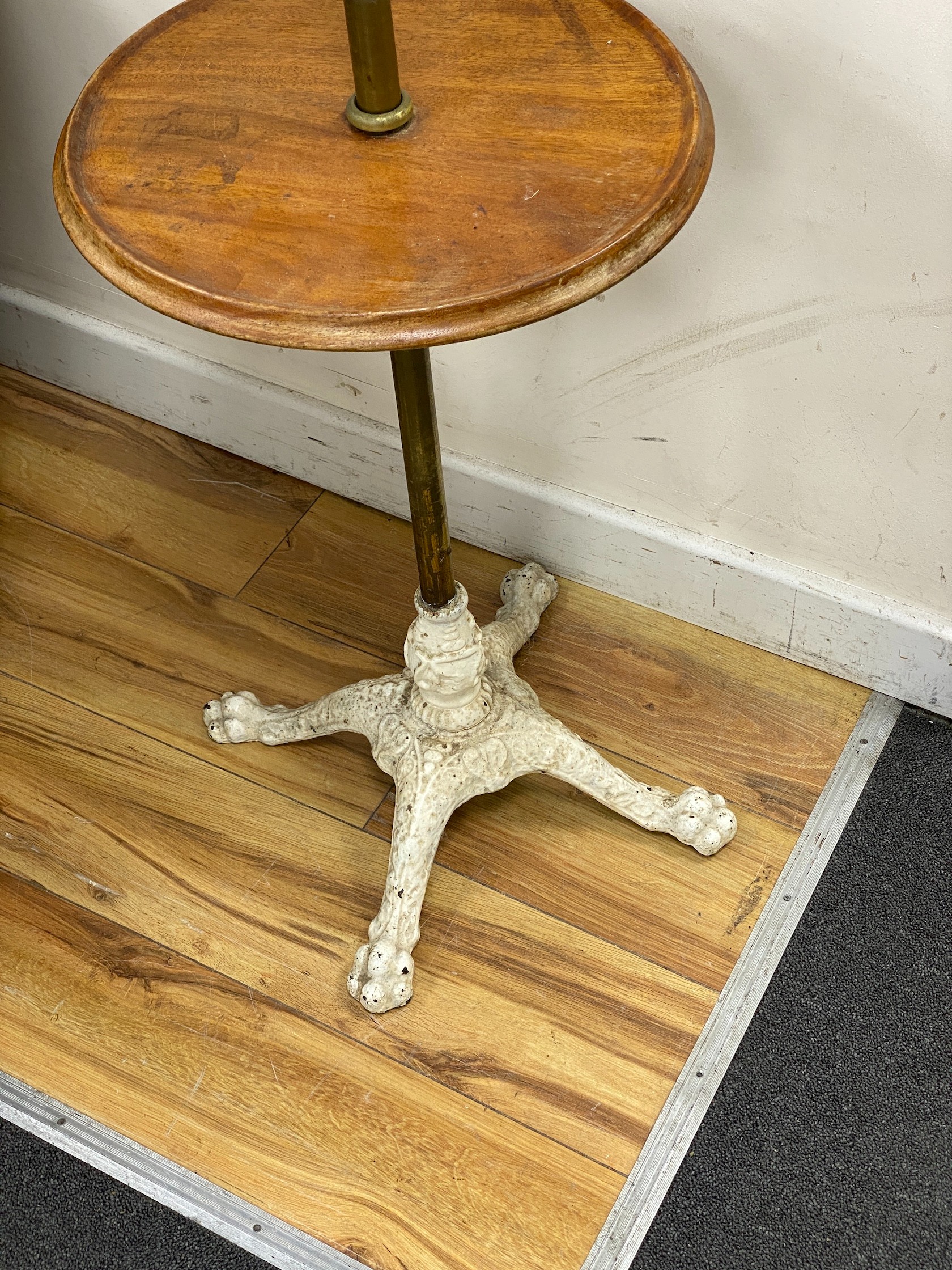 A Victorian mahogany brass and cast iron adjustable reading table, height 122cm